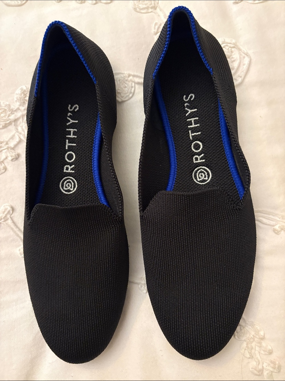 Rothy's Black Slip-On Loafers with Blue Trim